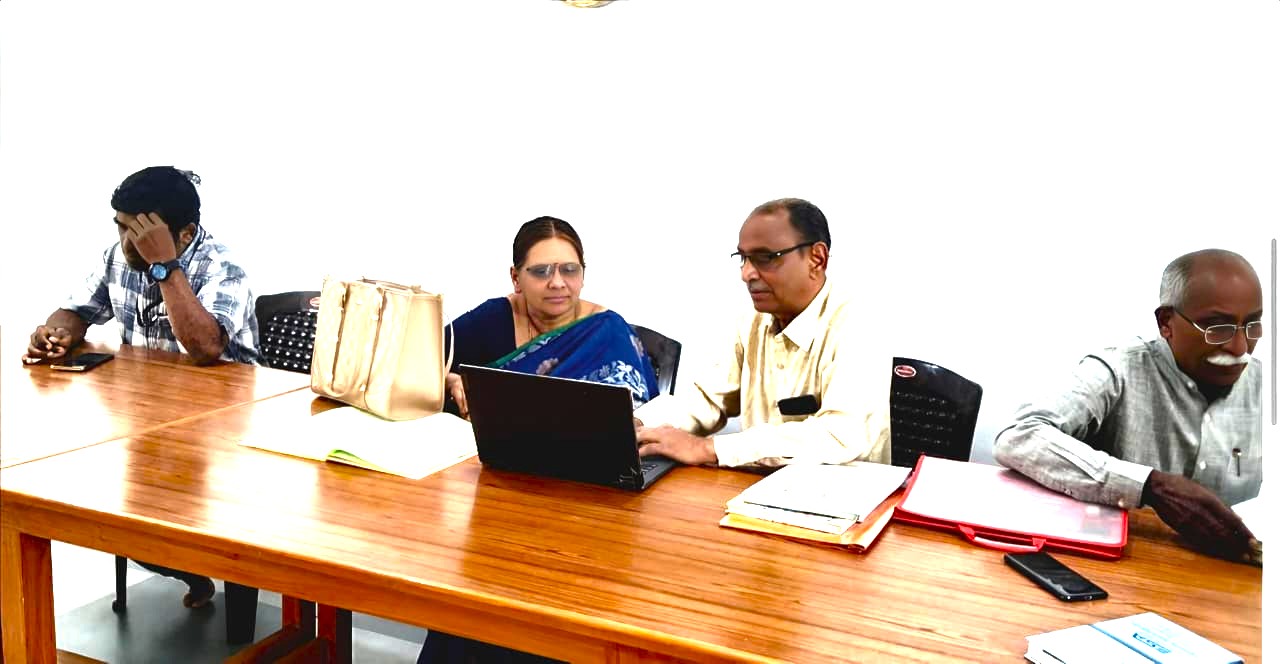 9 President showing the website of association to Project officer Nagamalliswari Garu.jpeg